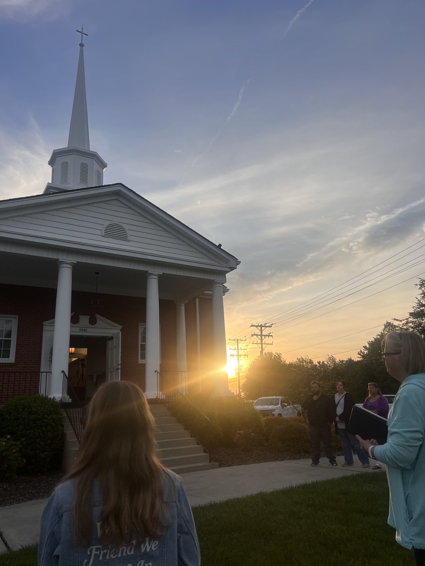 Congregation worshipping together on Sunday morning
